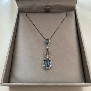 Sterling silver necklace with diamonds and blue gemstones